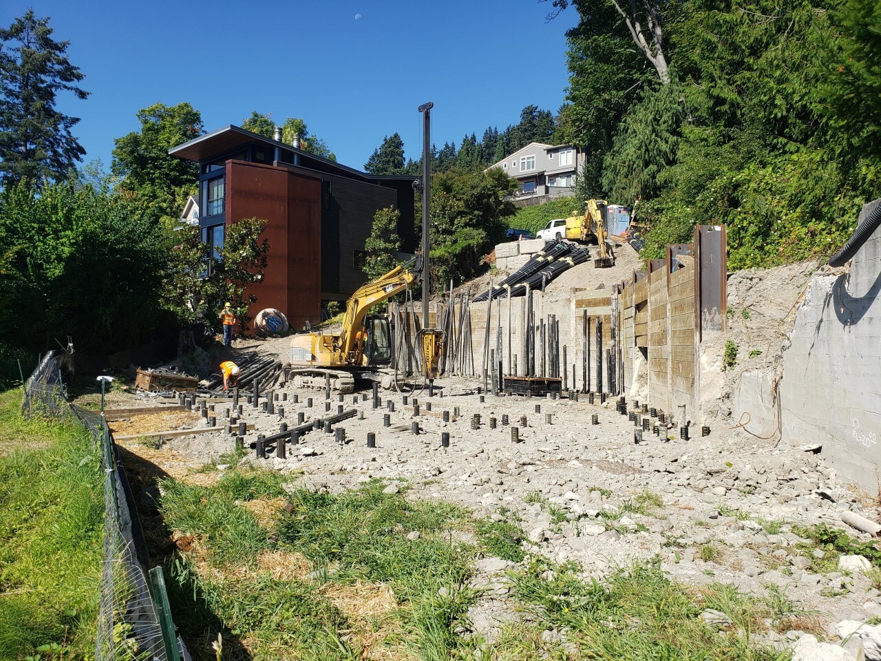 View of custom home site on Mercer Island with water and trees