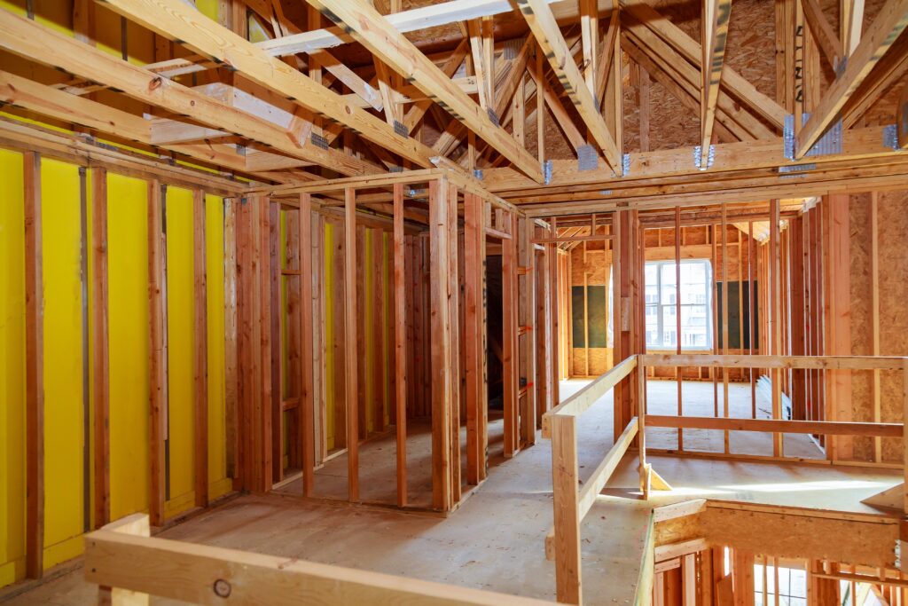 Framing and insulation work in progress in a custom home