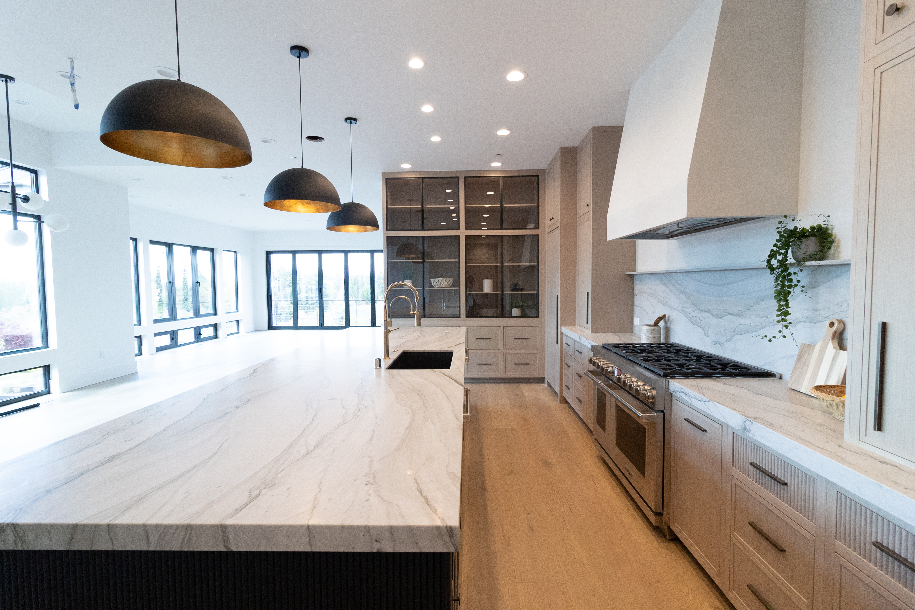 Custom home living area with fireplace and built-in shelving